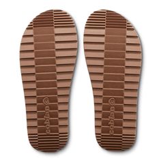 Comfortable synthetic leather strap with padded jersey lining; Cobian heritage patch and embroidered detail; Contoured Comfort molded midsole with anatomical arch support, cupped heel, and contoured forefoot; Soft cushioned top sole with perforated detail; SandTrek full rubber outsole, featuring directional wedge-shaped tread, for superior traction in sand and beach environments Brown Synthetic Slippers With Arch Support, Brown Synthetic Slides With Cushioned Footbed, Brown Synthetic Flip Flops With Textured Footbed, Comfortable Flip Flops, Tan Sandals, Shades Sunglasses, Men Model, Natural Shapes, Synthetic Leather