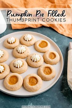 pumpkin pie filled thumbprint cookies on a plate