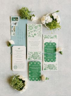 the wedding stationery was done in green and white