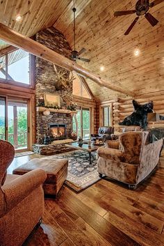 a living room with wooden walls and ceiling