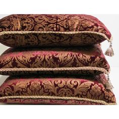 three pillows stacked on top of each other