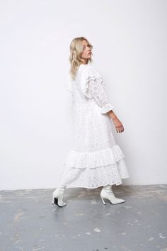 Gorgeous Eyelet Midi Dress Ruffle shoulders for a feminine touch Convenient back zipper closure True to size for a perfect fit Body fully lined, sleeves unlined for a lightweight feel Eyelet Midi Dress, Modest Tops, Textile Wall Hangings, Fit Body, New Arrival Dress, Tea Dress, Asymmetrical Hem, Modest Dresses, Asymmetric Hem