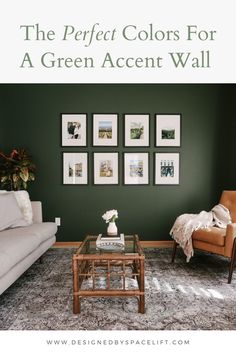 a living room with green walls and pictures on the wall above the couch, coffee table