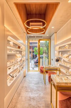 the inside of a jewelry store with lots of shelves