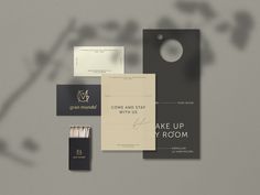 an assortment of business cards and envelopes