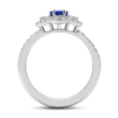 An impressive, brilliant sapphire sits at the helm of this masterfully designed ring. Four, specially cut half moon shaped diamonds are set at the north, south, east and west points of the center stone and are traced by a halo of petite diamonds. Whether it may be a gift to yourself, an engagement or wedding this jewel is a quintessential family heirloom. Metal: 18kt Gold Sapphire Weight: 0.95 ct. Half Moon Diamond Weight: 0.27 ct. Round Diamond Weight: 0.38 ct. Measurements: 14.0 mm length x 12 Marquise Cut Sapphire Diamond Ring With Center Stone, Celestial Sapphire Ring With Diamond For Anniversary, Celestial Style Sapphire Ring With Diamond For Anniversary, Sapphire Marquise Ring With Halo Setting, Celestial Diamond Ring With Center Stone, Sapphire Diamond Ring With Marquise Brilliant Cut, Sapphire Rings With Marquise Halo Setting, Sapphire Marquise Brilliant Cut Ring, Cluster Sapphire Diamond Ring With Halo Setting