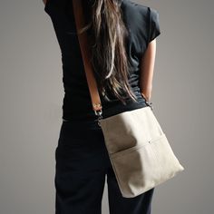 Urban-chic style crossbody bags that are neutral in color and effortlessly casual. When you need a mid-sized bag with easy access front pockets, just the right amount of not-too-slouchy shape and the perfect neutral shade, our updated take on the modern hobo bag is sized just right for everyday, on-the-go use. This listing is for the MEDIUM size bag in Khaki canvas. Canvas Hobo Bag, Waxed Canvas Bag, Vacation Bag, Urban Chic Fashion, Linen Bag, Sand Color, Urban Chic, Bag Straps, Hobo Bag