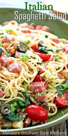 pasta with meat and vegetables in a green bowl