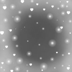 a black and white photo with hearts in the center, as if it were snowing