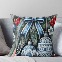 christmas ornaments with bows and holly leaves on a black background throw pillow