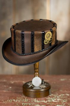 Steampunk Wembley Leather Top Hat by Overland Sheepskin Co. (style 70630) Steampunk Leather Top Hat With Flat Crown, Leather Costume Hat With Curved Brim, Adjustable Leather Costume Hat With Curved Brim, Adjustable Leather Curved Brim Costume Hat, Steampunk Leather Hat With Adjustable Fit, Steampunk Leather Hat Band With Short Brim, Fitted Leather High Crown Hat Bands, Fitted Leather Top Hat With High Crown, Adjustable Leather Steampunk Hat