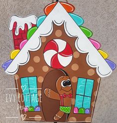 a gingerbread house is decorated with candy and candies