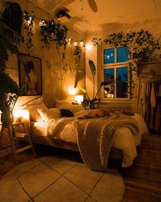 a bed room with a neatly made bed next to a window and a ceiling fan