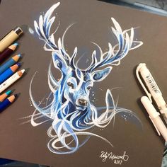 a drawing of a deer with blue eyes and antlers on it