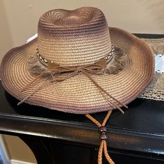 Nwt Western Boho Coastal Cowgirl Wide Brim Cowboy Hat Trimmed With Tassel, Braided And Jeweled Hat Band Wired Brim Making It Reshapable Adjustable Chin Strap Cord Holds The Hat In Place For Windy Days; Interior Adjustable Hat Band Woven Straw Color: Brown Brim 3.5” Hat Size 57 Cm Non-Smoking Home Wild West Boho Coastal Cowgirl Western Chic Bohemian Shabby Chic Beach Summer Sun Hat Brown Casual Straw Hat For Rodeo, Casual Brown Sun Hat For Rodeo, Brown Sun Hat For Spring Rodeo, Brown Spring Sun Hat For Rodeo, Brown Spring Rodeo Sun Hat, Spring Rodeo Brown Sun Hat, Brown Summer Hats For Rodeo, Brown Summer Hat For Rodeo, Summer Brown Hats For Rodeo