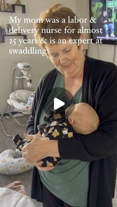 a woman holding a baby in her arms with the caption my mom was a labor & delivery nurse for almost 25 years and is an expert at swadling