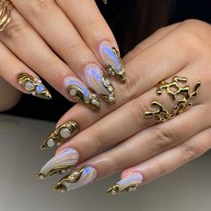 🌟 Luxurious Gold & Pearl Iridescent Press-On Nails 🌟 Transform your look with these elegant, handcrafted press-on nails that radiate opulence and sophistication. Designed with intricate gold accents, iridescent swirls, and pearl embellishments, this set is the epitome of luxury. Perfect for weddings, parties, or any occasion where you want to shine! 💅✨ ✨ Key Features ✨ 💎 Gold Elegance: Each nail is adorned with luxurious golden accents that add a royal touch to your manicure. 🌌 Iridescent Swirls: Stunning iridescent swirls create a mesmerizing, multidimensional effect. 🌟 3D Pearl Embellishments: Beautiful pearls bring a chic and sophisticated vibe to your nails. 🎨 Handcrafted Artistry: Every nail is carefully handcrafted to ensure a unique and flawless finish. 💅 Custom Fit: Availab Classy Nails Gold, Arcane Nails Design, Special Occasion Nails, Nail Ideas Short Nails, Gold Nails Design, Arcane Nails, Almond Nails Classy, Nail Ideas Short, Luxurious Nails