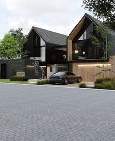 a car is parked in front of a house with black sidings and wood accents