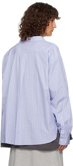 Cotton poplin shirt. Integrated cotton jersey T-shirt-style underlay with printed logo for alternate styling. · Pinstripes throughout · Layered construction · Spread collar · Button closure · Patch pocket · Shirttail hem · Dropped shoulders · Pleated single-button barrel cuffs · Box pleat at back yoke · Includes logo-printed polyester satin tie Supplier color: Stripe Blue Shirt With Signature Stripes For Work, Cotton Button-up Shirt With Signature Stripes, Button-up Shirt With Signature Stripes For Work, Workwear Button-up Shirt With Signature Stripes, Classic Tops With Signature Stripes For Work, Classic Workwear Tops With Signature Stripes, Cotton Tops With Vertical Stripes For Daywear, Collared Tops With Signature Stripes For Work, Cotton Tops With Signature Stripes For Work