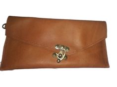 "Asymmetric Wristlet Leather Clutch with Swing hook clasp closure. Handmade with natural leather clutch - bag Dimensions approx: 11,2'' x 5,5\"\" (28,5cm. x 14cm) I have always looked for creating pieces with a compelling blend of PERSONALITY and purity. A gorgeous leather clutch perfect as a gift for you or someone special in your life. Add a HAND BURNING initials for an extra personal touch. - Two pockets inside: Small 4'' x 2,7'' (10cm. x 7cm), Large 7,5'' x 4'' (19cm. x 10cm) with YKK heavy Brown Leather Clutch, Leather Clutch Bag, Gorgeous Leather, Insect Bites, Envelope Clutch, Leather Clutch Bags, Unique Antiques, Hook Clasp, Crazy Horse