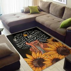 a living room with couches and sunflowers on the floor