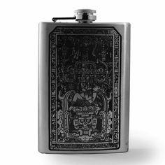 a black and white photo of a flask with an image of a person on it