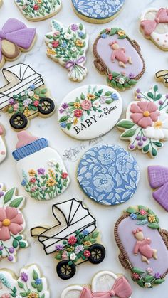 some decorated cookies are laying on a table