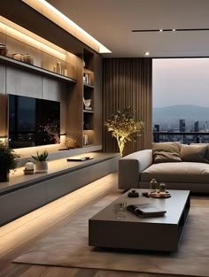 a living room filled with furniture and a flat screen tv mounted on the wall above it