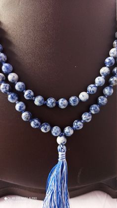 108 Beads// Natural Sodalite Japa Mala Prayer Beads semi-precious Gemstone Sad Sodalite Round Beads // Long Tassel Necklace// Meditation japa mala // Guru bead// Necklace Yoga Beads sad blue Color // 8 mm Bids size - 8mm It is known as the 'love stone' as the message it emits is the strong vibration of unconditional love, joy, warmth and healing. As quartz crystals are profound amplifiers of energy, it may help to kindle happiness, love, romantic feelings and sensuality. It is good for people in Blue Round Beads Mala For Meditation, Adjustable Lapis Lazuli Beaded Necklace With 8mm Beads, Spiritual Polished Lapis Lazuli Beads, Blue 8mm Beads Spiritual Mala, Blue Mala With 8mm Beads For Meditation, Blue Spiritual Mala With 8mm Beads, Spiritual Lapis Lazuli Round Beads, Blue Natural Stone Beads For Meditation, Blue Natural Stones Beads For Meditation