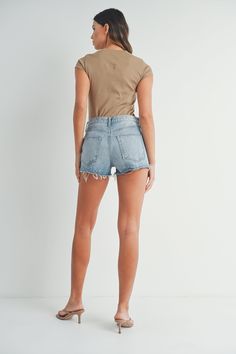 The Laddy Shorts are just what we need going into the warmer days ahead! A relaxed fit, raw edge hem and slight distressing make these the perfect short! Specs taken from size Medium: Waist: 29" Rise " Inseam: 13" Material: Denim Daisy Shorts, Bicycle Shorts, Black Tank Dress, Black Aviators, Bandana Hairstyles, Fit Details, Denim Details, Boyfriend Tee, High Rise Shorts