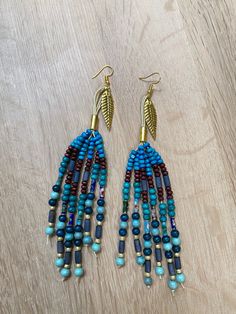 "Beaded statement earrings. Measurements: 15 cm (6\")long Match these statement earrings with one of our bags!" Hoop Earrings Big, Earrings With Beads, Fork Jewelry, Earrings Big, Boho Green, Hippie Festival, Colorful Earrings, Earrings Boho, Jewelry Earrings Hoops