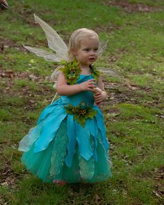 A Pretty Blue Fairy Dress?!? Yes please! This is a one of a kind creation made specifically to fit a wide range of sizes. It is shown on a 2 year old, but will fit up to a size 6. You get 3 pieces: The crown, the dress and tutu underskirt. The straps are adjustable too. No need for pins or clips. *Wings sold separately. *dress advertised as shown, additional hemming, fabric paint, flowers, and/or appliques can be arranged via embellishment and painting upgrades. Fairytale Tulle Fairy Dress For Pageant, Fairytale Tulle Fairy Dress For Pageants, Whimsical Tulle Princess Dress, Whimsical Tulle Fairy Dress For Fancy Dress, Green Fairy Dress For Dress-up, Fairy Style Princess Dress For Fancy Dress, Fairy Style Tulle Princess Dress For Fancy Dress, Tulle Fairy Dress For Fancy Dress Occasions, Fairy Style Tulle Dress For Fancy Dress