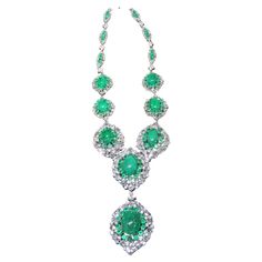 A Rare 18KT White Gold Emerald Diamond Necklace. Necklace is comprised of Finely Set Glittering Gorgeous Cabochon Emerald Necklace adorned with Sparkling Rose Cut and Round Diamonds and Round Emeralds!! T.C.W. approx 70CTS!!! This Gorgeous Necklace is a Sample Piece from a Private Manufacturer that sold to Important 5 Star Hotel and Fine Jewelry Stores. Comes NWT: $134,000.00. A Magnificent Breathtaking Masterpiece!!! Emerald Diamond Necklace, Diamond Drop Necklace, Sparkling Rose, Expensive Diamond, Diamond Necklace Set, Emerald Necklace, Expensive Jewelry, Star Hotel, Necklace Necklace