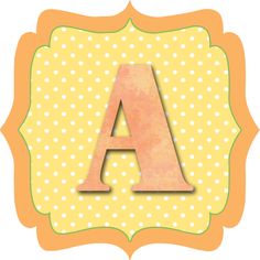 an orange and yellow polka doted frame with the letter a in it's center