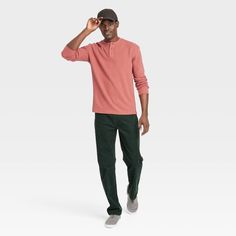 Spruce up your transition-weather wardrobe with this Long-Sleeve Henley T-Shirt from Goodfellow & Co™. This pullover tee is fashioned in a solid shade with a ribbed texture, elevated by the classic henley neckline featuring a three-button placket front and long sleeves with banded wrists. Crafted for both style and comfort, this regular-fit T-shirt is made from a midweight cotton-recycled polyester blend for breathable wear. Goodfellow & Co™: Feel good in what you wear, anywhere. Casual Relaxed Fit Henley For Spring, Casual Winter T-shirt, Casual Cotton Henley For Winter, Casual Fall Henley, Casual Fall Henley Shirt, Casual Cotton Crew Neck Henley, Solid Cotton Henley For Fall, Casual Long Sleeve T-shirt For Gatherings, Cotton Henley For Fall