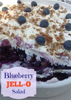 a blueberry jello - o salad in a white dish