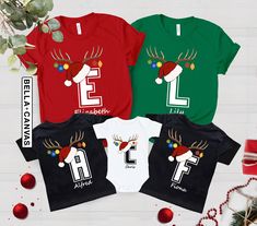 "Christmas Custom Name Initial Shirt, Family Christmas Shirt, Personalized Christmas Couple Tshirt, Christmas Group Tee, Xmas Matching Pajama BLACK TEXT is used by for Yellow, Heather Peach, White, Light Gray Heather Shirts. WHITE TEXT is used by Other Colored Shirts. Welcome to our shop, RoseTeesDesign. We hope you enjoy shopping and browsing through our fun selection of t-shirts. We try out best to provide the best quality for our customers and value your satisfaction before anything else. We Family Matching Christmas Shirt With Letter Print, Holiday Family Matching T-shirt With Letter Print, Family Matching Red T-shirt For Christmas, Red Family Matching Holiday T-shirt, Family Matching Christmas T-shirt With Letter Print, Single Shirt, Fun Sweatshirts, Matching Pajamas, Family Christmas Shirts