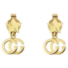 Crafted from precious yellow gold, this set of earrings pairs a contemporary House code with one of the brand's most recognizable emblems. Guccio Gucci's monogram appears as a hanging pendant, paired with engraved star studs. The combination not only pays tribute to Gucci's roots but, also connects different chapters of House history. 18k yellow gold Length: 11.5mm Made in Italy Yellow Gold Drop Earrings, Gold Star Earrings, Monogram Pendant, Gucci Jewelry, Golden Earrings, Latest Jewellery, Yellow Gold Bracelet, Star Studs, Yellow Gold Earring