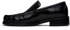 Polished calfskin loafers in black. · Logo stamp at square moc toe · Grained lambskin and suede lining · Stacked calfskin heel with rubber injection · Calfskin outsole Supplier color: Black Black Square Toe Calf Leather Loafers, Black Square-toe Calf Leather Loafers, Designer Black Slip-on Loafers, Black Cushioned Slip-on Loafers, Black Slip-on Tassel Loafers With Textured Sole, Black Timeless Slip-on Tassel Loafers, Black Slip-on Loafers With Buckle Closure, Logo Stamp, Black Logo