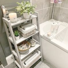 a bathroom with a sink, toilet and bathtub in it's corner next to the shower