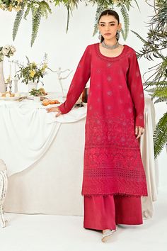 Presenting "Rosewood," a timeless addition to our collection. This deep pink ensemble boasts subtle yet sophisticated tone-on-tone chikankari embroidery, exuding understated grace. Paired with sleek straight trouser pants, it effortlessly transitions from daily wear to office chic, embodying comfort and class with every stitch. Elevate your wardrobe with the enduring charm of "Rosewood," where style meets versatility in perfect harmony. Elegant Pink Sets With Cutwork, Elegant Pink Cutwork Set, Red Floor-length Salwar Kameez For Transitional Season, Chikankari Embroidery, Office Chic, Chic Office, Straight Trousers, Deep Pink, Perfect Harmony