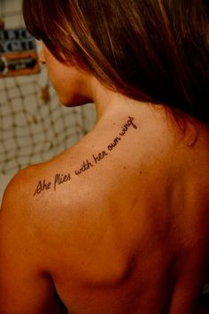 the back of a woman's shoulder with an inscription on it that reads 25 most beautiful tattoo design ideas & inspiration