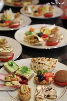 several plates with different types of food on them