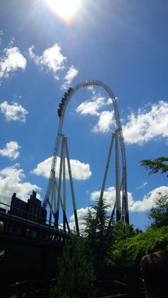 the roller coaster at six flags amusement park is seen in this photo taken from below