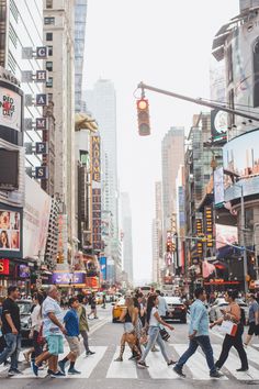 people crossing the street in new york city