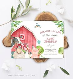 the farm animals are on top of the red barn birthday party card with greenery