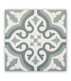 a gray and white tile with an ornate design