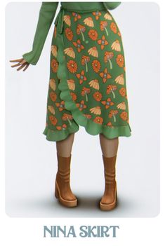 a woman in a green dress and brown boots is standing with her hands on her hips