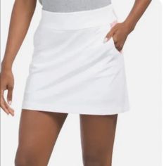 Nwt Greg Norman Four Way Stretch Golf Skort Moisture Wicking Fabric To Keep You Cool And Dry Built In Short Tights 2 Front Side Pocket With Additional Ball/Tee Pocket On Right Side And One Rear Pocket Elastic Waist Summer White Skort For Workwear, White Skort For Summer Workwear, White Summer Workwear Skort, White Sporty Skort For Spring, Sporty White Skort For Spring, White Cotton Short Skort, White Stretch Skort With Pockets, White Short Skort With Pockets, White Sports Skort For Spring