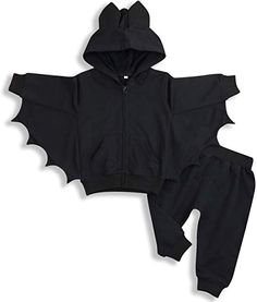 a child's black hoodie and pants set with a bat design on the front